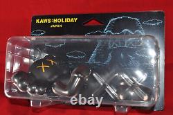 A KAWS Holiday Japan Laying Black Brand New in Original Packaging