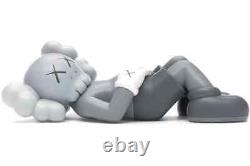 A KAWS Holiday Japan Laying Grey Brand New in Original Packaging