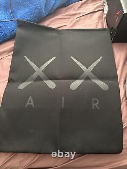 Air Jordan Retro 4 KAWS Cool Grey Never Worn. New Condition Size 13