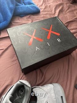 Air Jordan Retro 4 KAWS Cool Grey Never Worn. New Condition Size 13