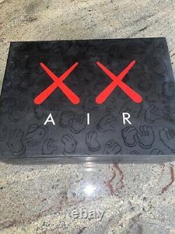 Jordan 4 KAWS Grey With Clothing Capsule Included DEADSTOCK DS