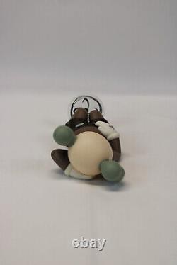 KAWS Holiday Japan Vinyl Figure Brown