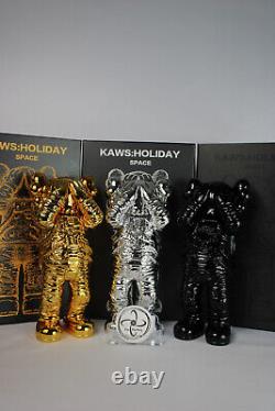 KAWS Holiday Space Figure Gold/Black/Silver Set