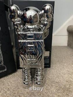 KAWS Holiday Space Figure silver