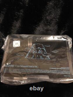 KAWS JAPAN HOLIDAY Laying Black 9 Vinyl Figurine