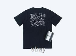 KAWS Seeing Watching Canned Black Pocket T-shirt Size Medium