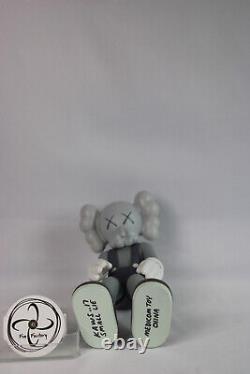 KAWS Small Lie Companion Vinyl Figure Grey