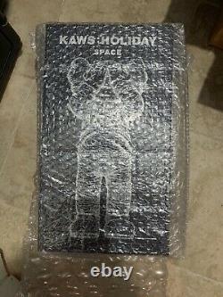 Kaws Holiday Space Silver Figure AUTHENTIC in hand? Factory Sealed