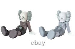 Kaws Holiday Taipei figures brown and grey