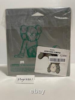 Kaws Holiday Taipei figures brown and grey