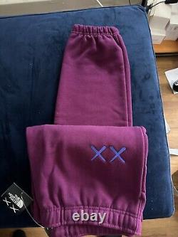 The North Face x KAWS Sweatpant Pamploma Purple Large Brand New